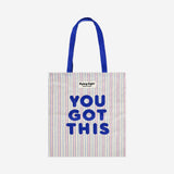 Striped tote bag with blue handles