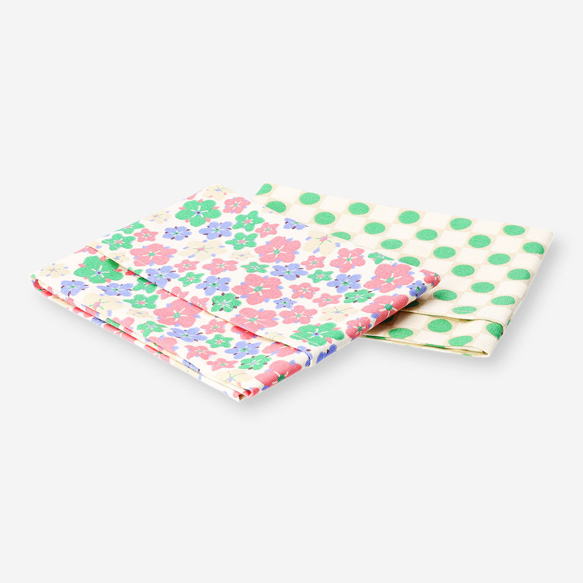 Set of two Flying Tiger Copenhagen kitchen tea towels with colorful dots and floral patterns, perfect for kitchen decor.