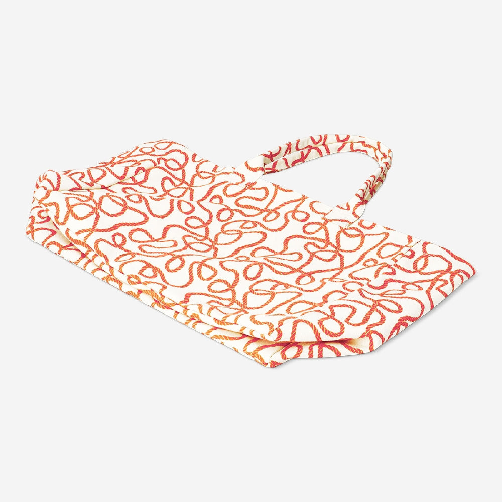Textile shopper bag with Robe print from Flying Tiger Copenhagen, showing a spacious bag with colorful fabric design.