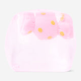 Pink Fidget Cube gadget by Flying Tiger Copenhagen with textured surfaces for tactile sensory stimulation.