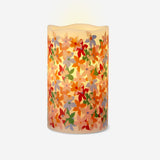 LED pillar candle with floral print, 10 cm tall, from Flying Tiger Copenhagen, ideal for home decor and ambient lighting.