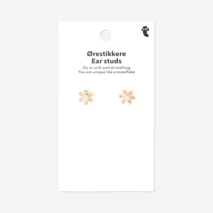Textile snowflake ear studs by Flying Tiger Copenhagen with intricate snowflake designs on lightweight fabric.