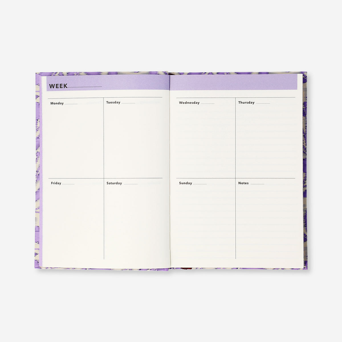A5 floral study planner by Flying Tiger Copenhagen featuring a colorful floral cover and weekly planner pages for office use.