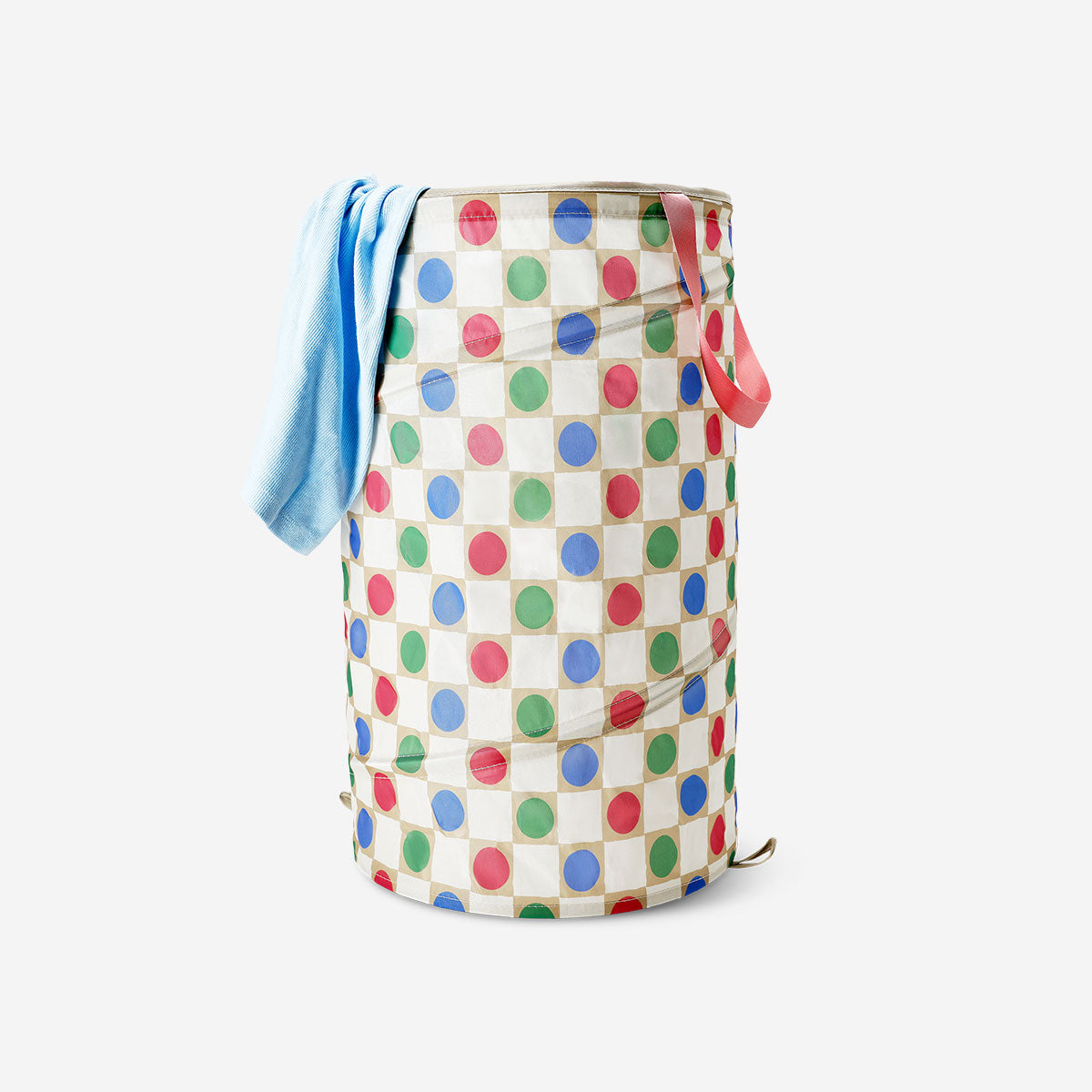 Colorful dotted laundry basket from Flying Tiger Copenhagen, 35x48 cm, made of durable fabric with vibrant dotted pattern.