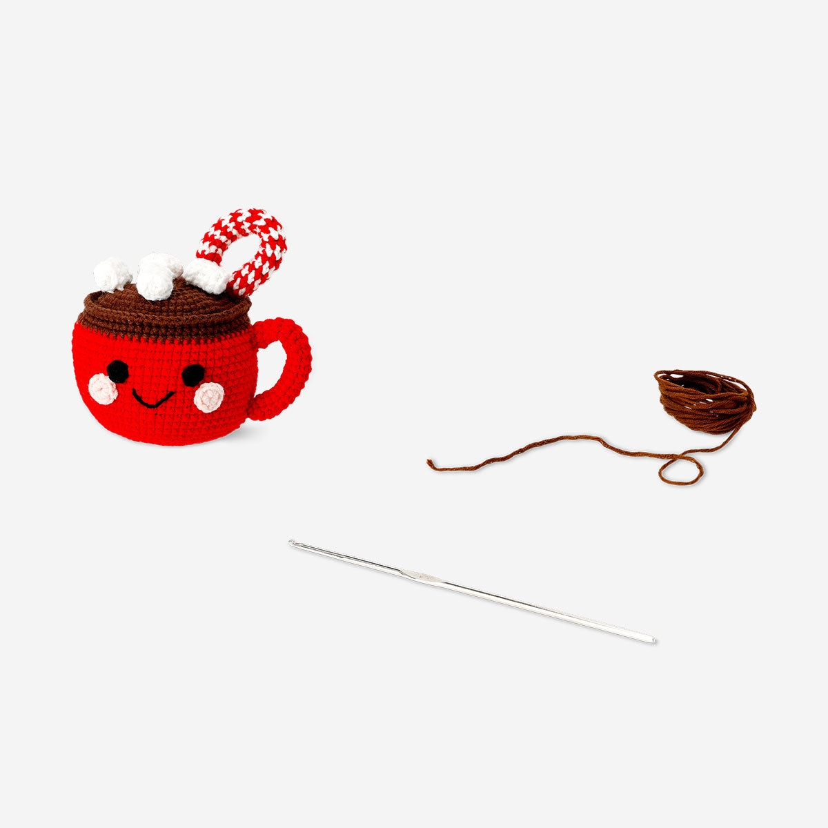 DIY crochet mug with hot chocolate, hobby kit from Flying Tiger Copenhagen, featuring a crocheted mug and a cup of hot chocolate.