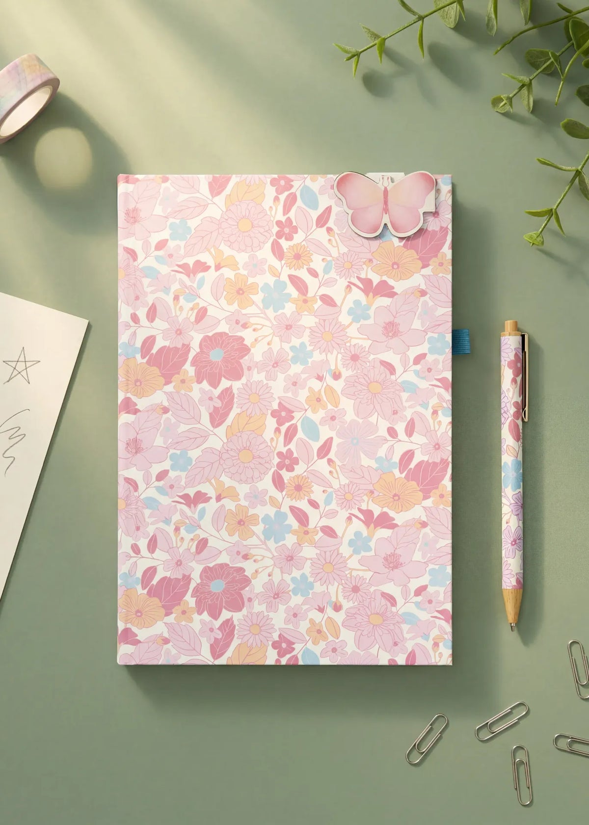 A5 floral office notebook with a pen and magnetic bookmark, featuring colorful flower patterns and a sleek design.