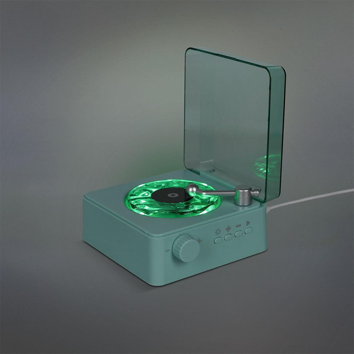 Flying Tiger Copenhagen wireless speaker with vinyl record design and built-in light, portable media device for music playback.