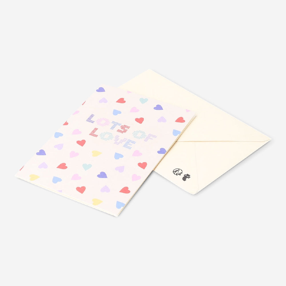 Flying Tiger Copenhagen greetings card featuring "Lots of Love" with hearts, perfect for sending warm wishes.