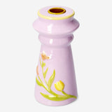 Candle holder with embossed flowers