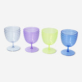Set of four pearlescent wine glasses with dotted design for parties, featuring Flying Tiger Copenhagen style and elegant appearance.