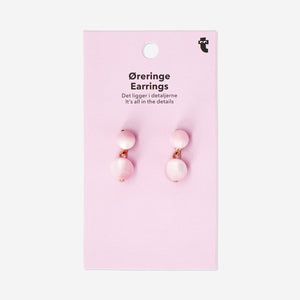 Flying Tiger Copenhagen hanging earrings with pink textile stones, featuring delicate dangling design and vibrant color details.