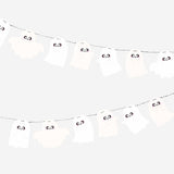 Halloween felt garland with ghost shapes, 200 cm long, ideal for spooky party decorations by Flying Tiger Copenhagen.