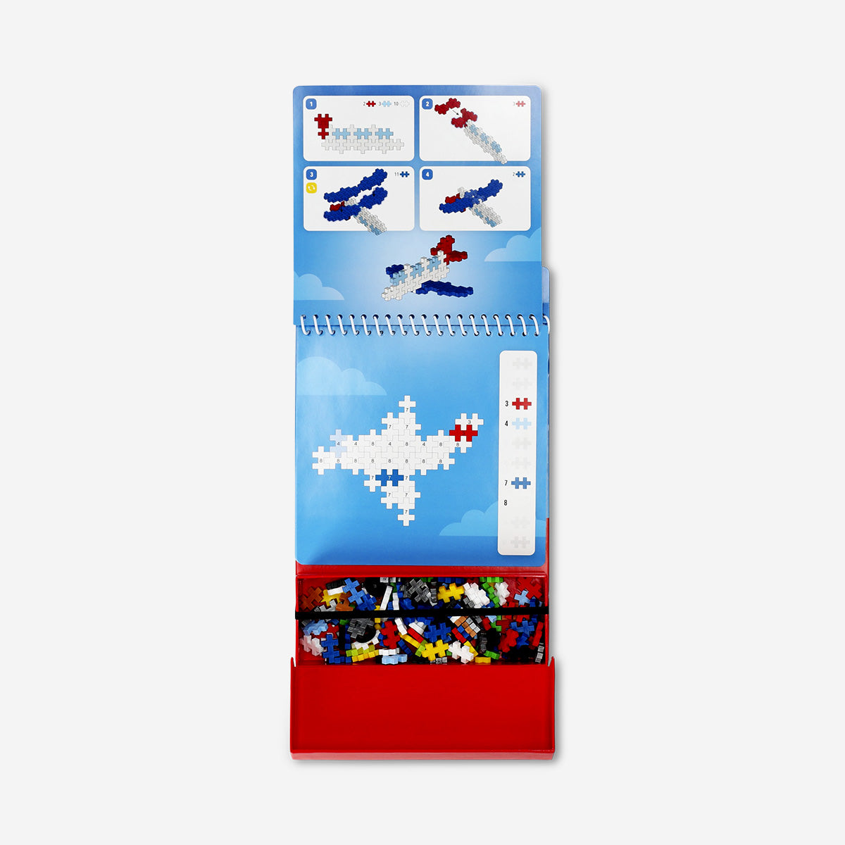 Colorful Flying Tiger Copenhagen Plus Plus transportation activity toy with building bricks for creative play.