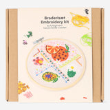 Embroidery kit with tropical print by Flying Tiger Copenhagen, including colorful threads and fabric for hobby embroidery projects.