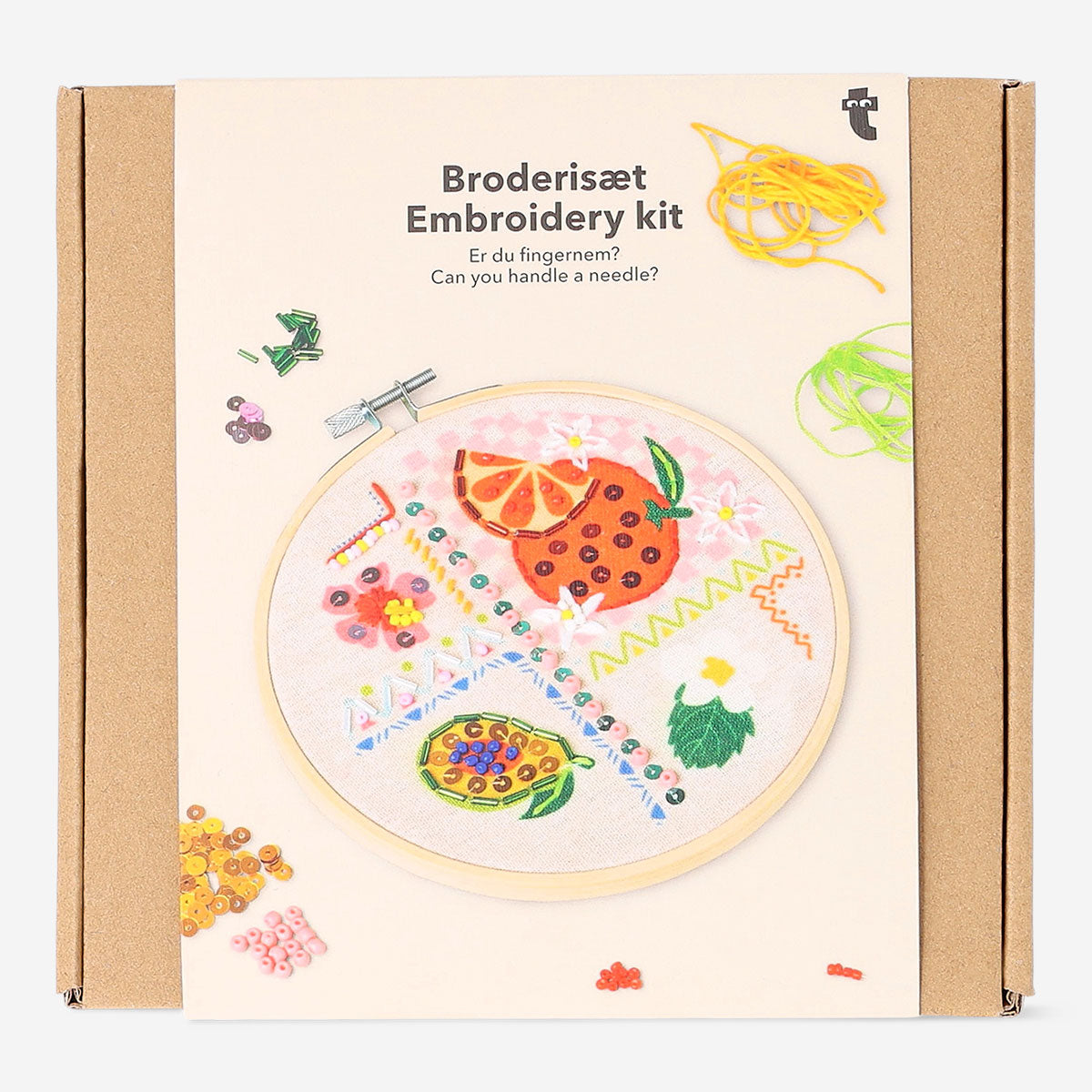 Embroidery kit with tropical print by Flying Tiger Copenhagen, including colorful threads and fabric for hobby embroidery projects.