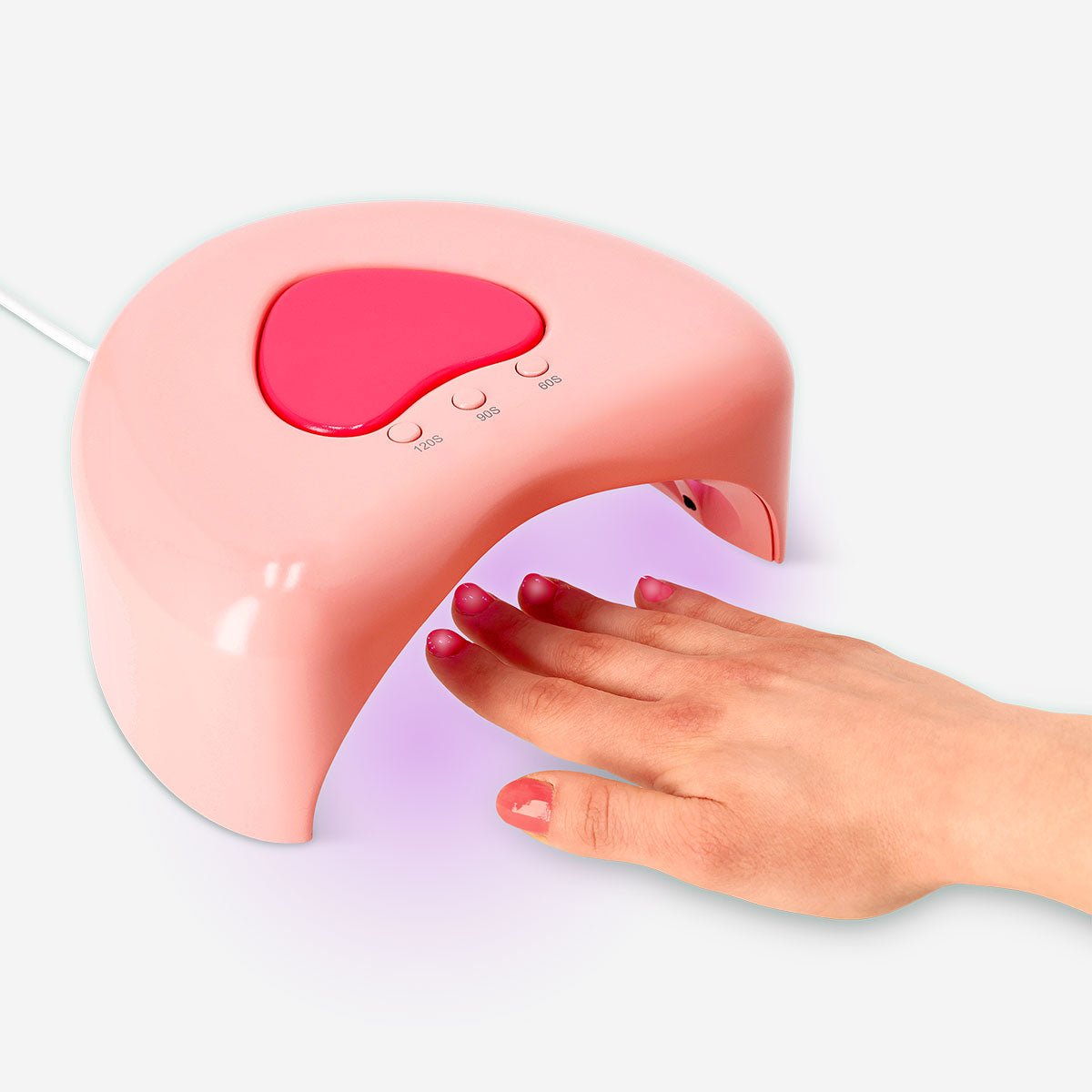 Flying Tiger Copenhagen Heart UV nail lamp for gel polish, compact personal care device with heart-shaped design for at-home gel nails.