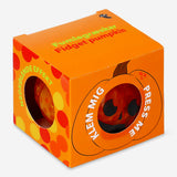 Flying Tiger Copenhagen pumpkin press me toy gadget with vibrant orange pumpkin design and playful pressing mechanism.