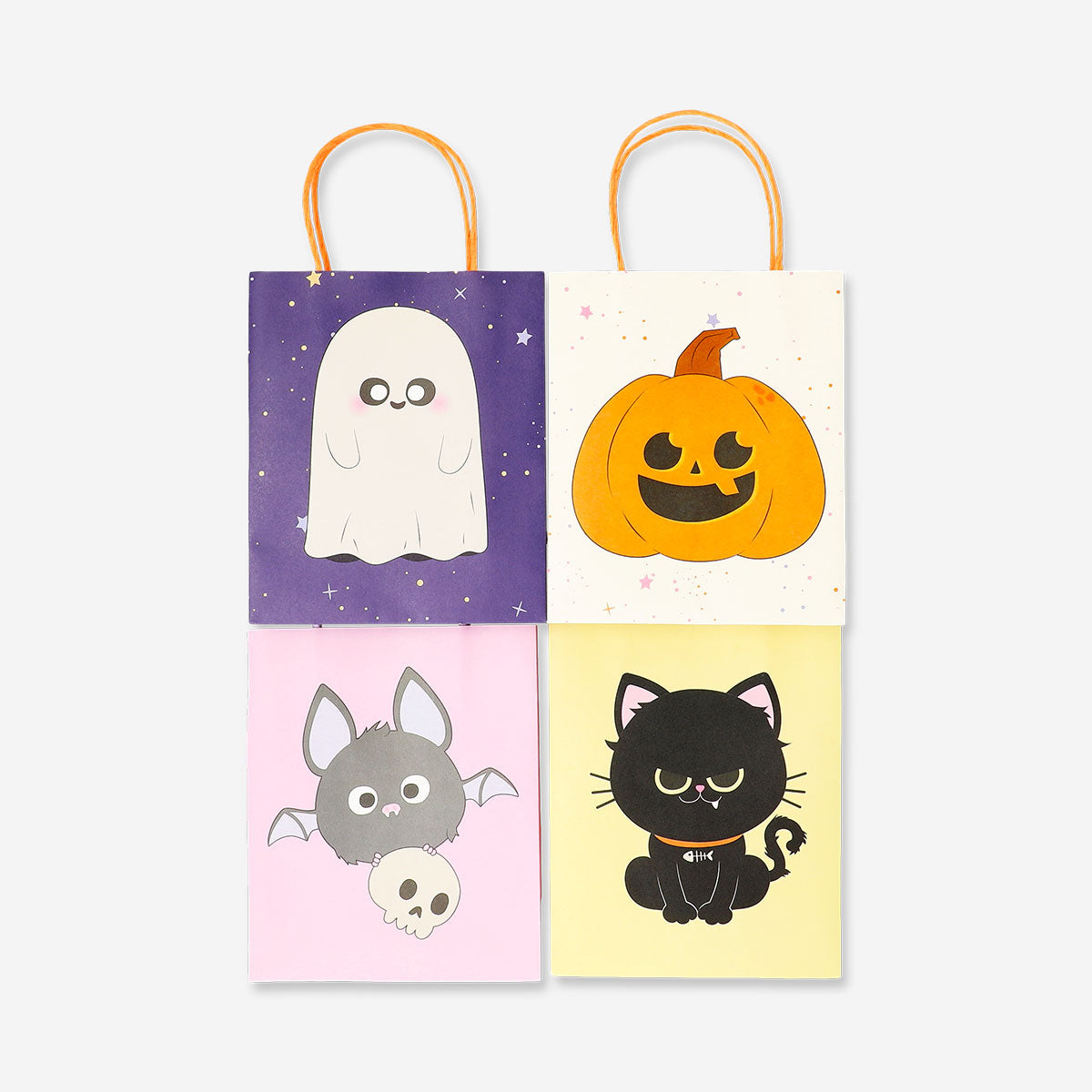 Four Halloween print gift bags for office use, featuring festive designs, from Flying Tiger Copenhagen.