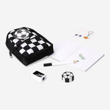 Mini soccer-themed stationery kit in a compact office mini backpack by Flying Tiger Copenhagen, with colorful pens and notepads inside.