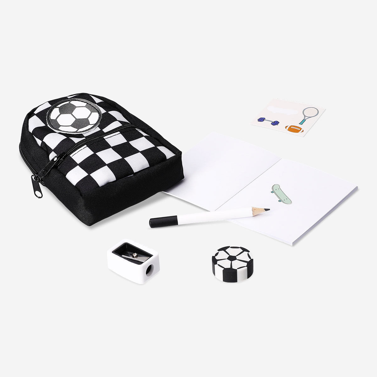 Mini soccer-themed stationery kit in a compact office mini backpack by Flying Tiger Copenhagen, with colorful pens and notepads inside.