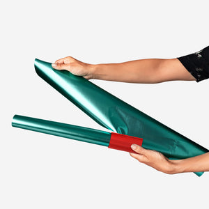 Flying Tiger Copenhagen office wrapping paper cutter with a metal blade and plastic handle for clean, precise cuts.