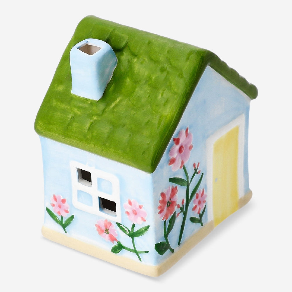 Decorative blue ceramic house from Flying Tiger Copenhagen, 11 cm tall, featuring a charming home design for interior decor.