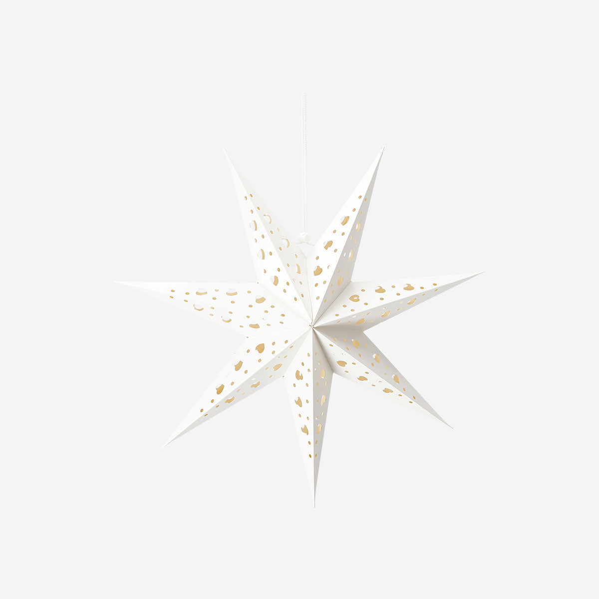 White glowing paper star home decor by Flying Tiger Copenhagen, illuminated and hanging as a decorative light.