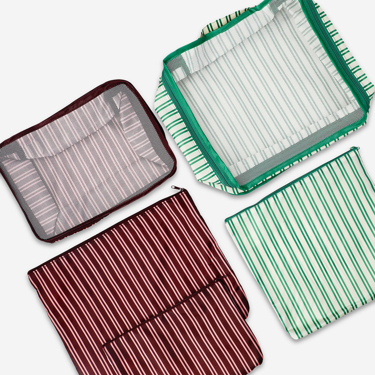 Set of five Flying Tiger Copenhagen leisure organiser bags for travel, showing colorful, compact storage pouches in a variety of sizes.