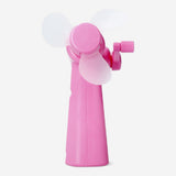 Pink handheld fan gadget from Flying Tiger Copenhagen, compact and portable with a sleek design for cooling on the go.