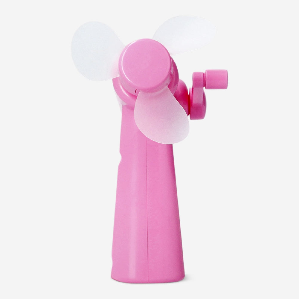 Pink handheld fan gadget from Flying Tiger Copenhagen, compact and portable with a sleek design for cooling on the go.
