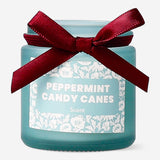 Flying Tiger Copenhagen scented candle with candy cane fragrance, featuring a festive holiday design and warm glow for home decor.