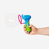 Flying Tiger Copenhagen soap bubble blaster toy with colorful plastic handle and bubble solution tray.