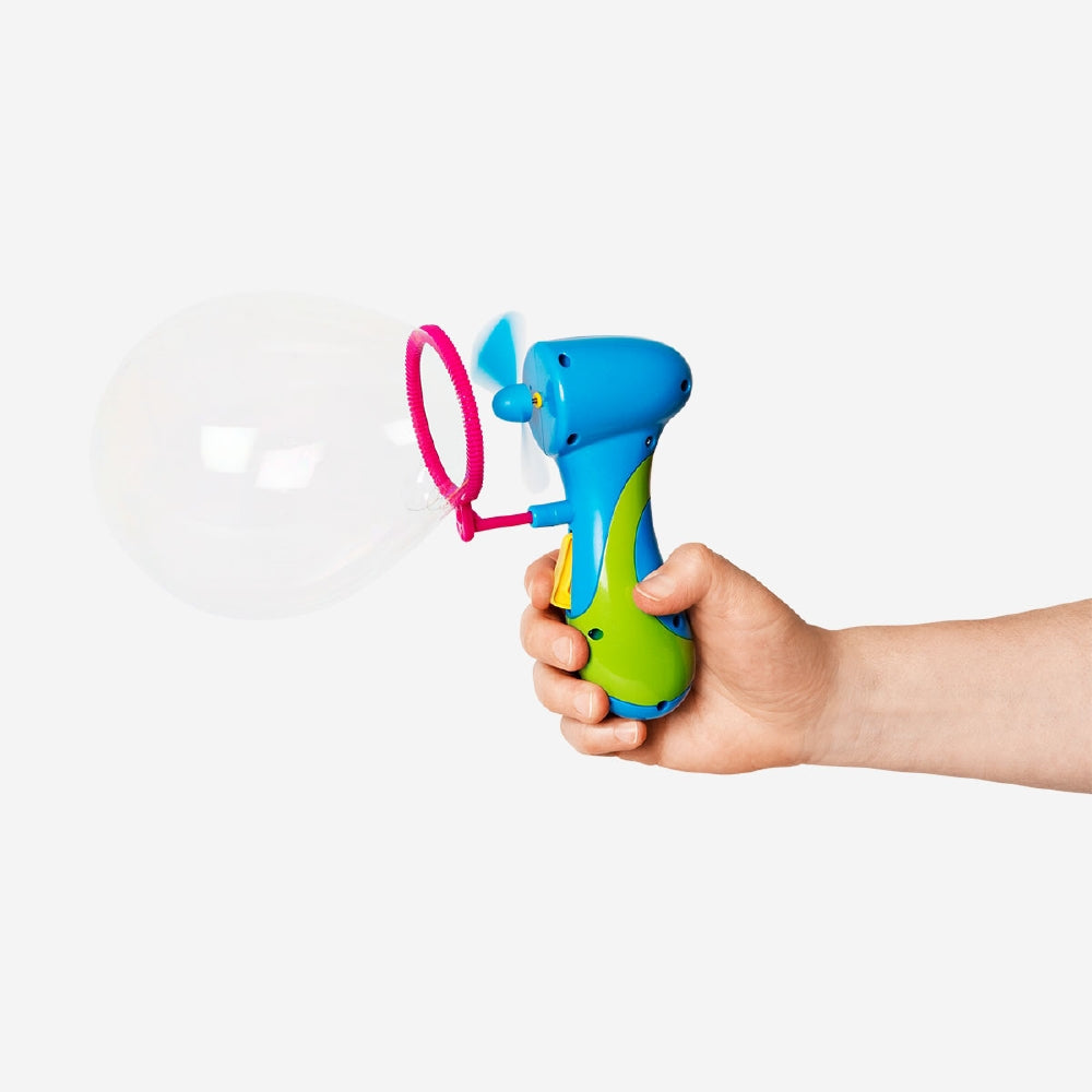 Flying Tiger Copenhagen soap bubble blaster toy with colorful plastic handle and bubble solution tray.