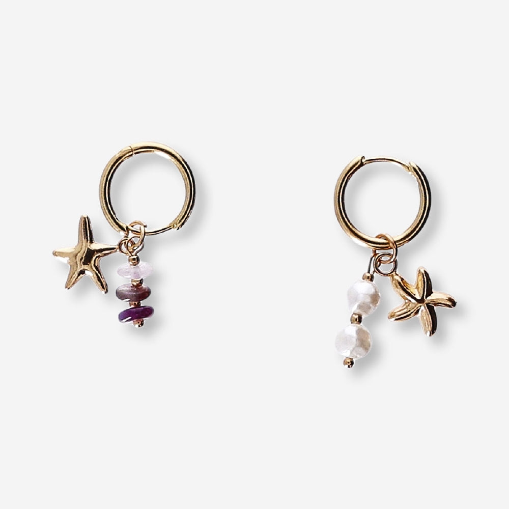 Textile hanging earrings with seastar charms and decorative details, featuring a colorful, handcrafted design from Flying Tiger Copenhagen.