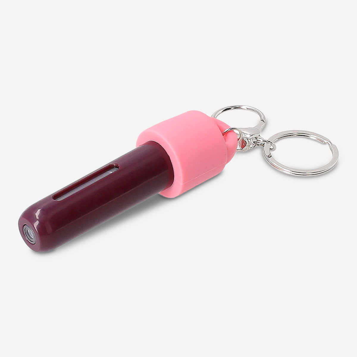 Refillable Flying Tiger Copenhagen travel perfume bottle with silicone cover and carabiner for easy carry and secure storage.