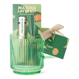 Flying Tiger Copenhagen matcha kit with ceramic mug, bamboo whisk, and green matcha powder for traditional tea preparation.