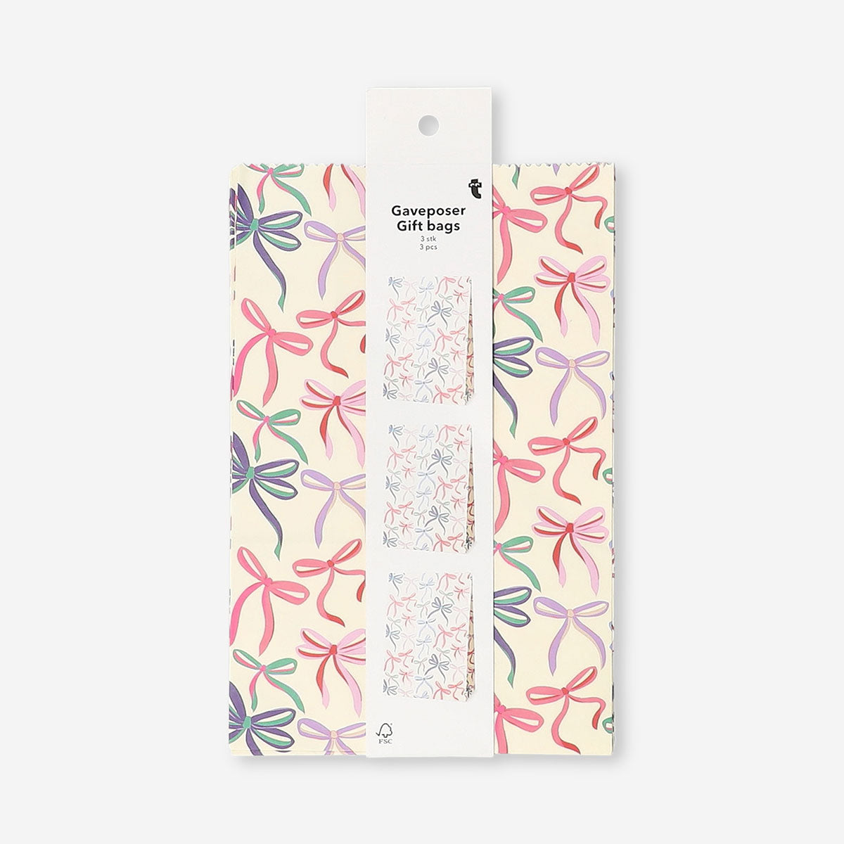 Set of three office paper bags with decorative bows from Flying Tiger Copenhagen, featuring a simple, elegant design.