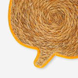 Woven cattail pumpkin-shaped placemat from Flying Tiger Copenhagen, 33 cm, ideal for rustic kitchen table decor.