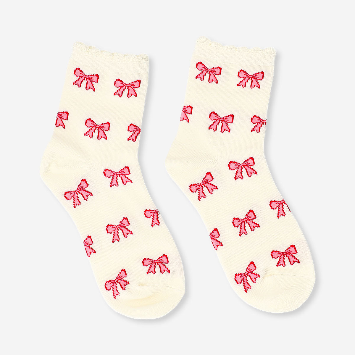 Pink textile socks with bow accents, size 36/38, by Flying Tiger Copenhagen, featuring a soft fabric and decorative bows.
