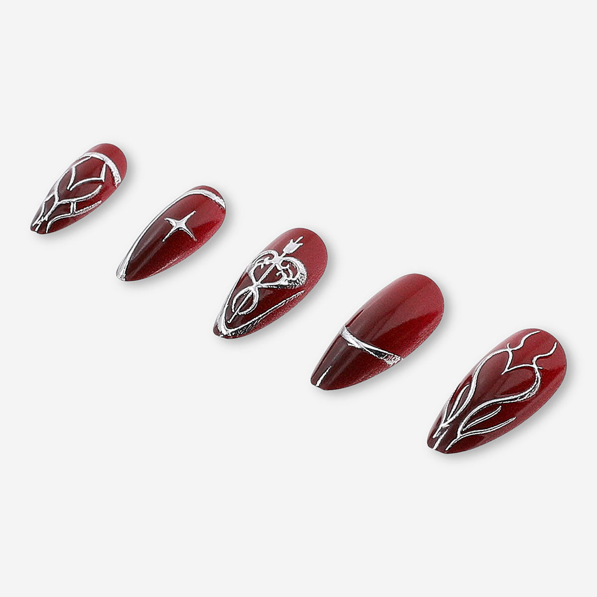 Flying Tiger Copenhagen press-on nails in red with silver design, showcasing a stylish and festive personal care accessory.