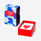Flying Tiger Copenhagen playing cards for games, featuring colorful card designs on a standard deck.