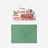 Fold-out train Christmas card from Flying Tiger Copenhagen with festive holiday design and colorful train illustration.
