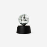 Flying Tiger Copenhagen rotating disco light gadget with colorful LED lights and adjustable settings, perfect for parties and celebrations.
