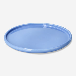 Blue 20cm ceramic plate from Flying Tiger Copenhagen's Designer Collection, ideal for kitchen serving and decor.