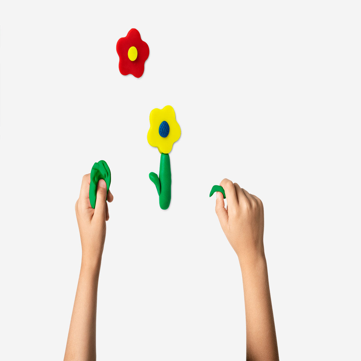 Kids' dough set hobby by Flying Tiger Copenhagen with colorful modeling clay and tools for creative play.