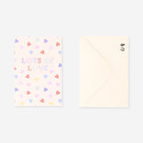 Flying Tiger Copenhagen greetings card with "Lots of Love" and heart illustrations, ideal for expressing affection.