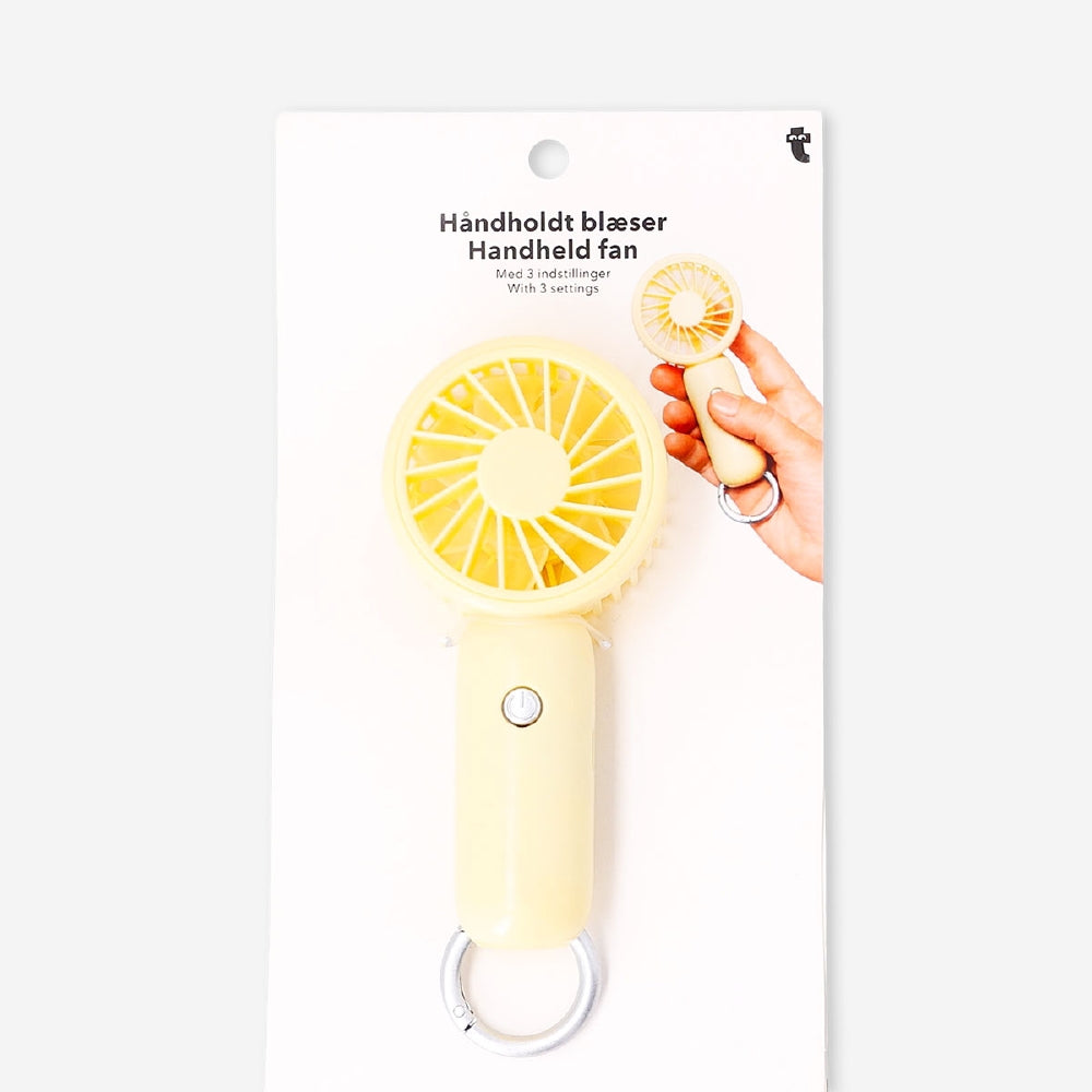 Yellow handheld fan gadget with three adjustable settings by Flying Tiger Copenhagen, featuring a compact, portable design.