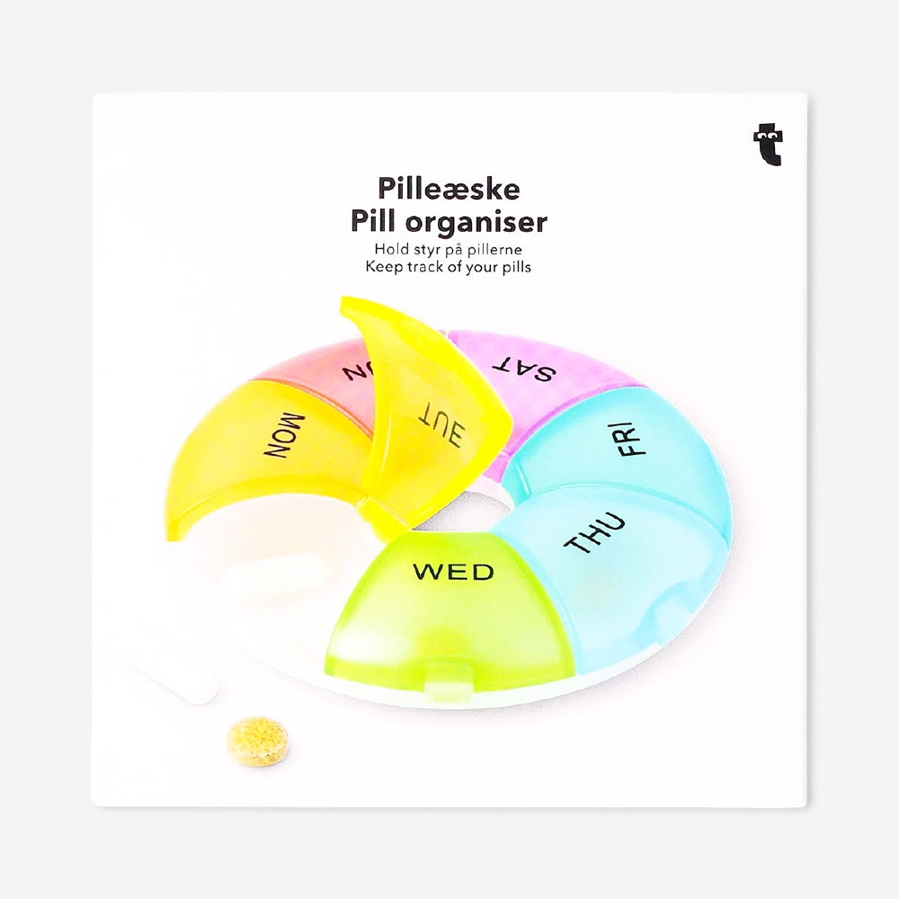 Weekly rainbow pill organiser from Flying Tiger Copenhagen with colorful compartments for medication or supplements.