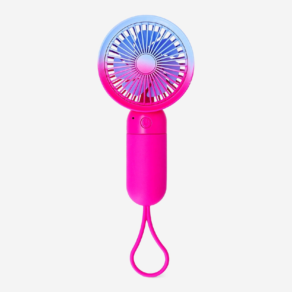 Gradient pink handheld fan with strap, Flying Tiger Copenhagen gadget, compact portable fan for personal cooling.