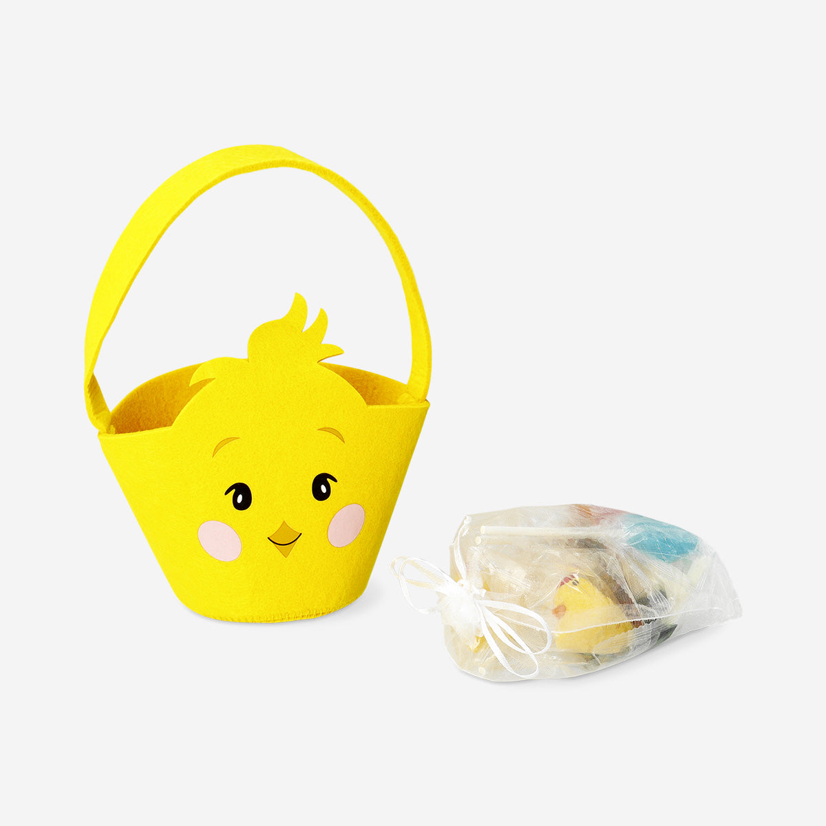 Colorful candy mix in a felt Easter chicken basket from Flying Tiger Copenhagen, perfect for spring celebrations.